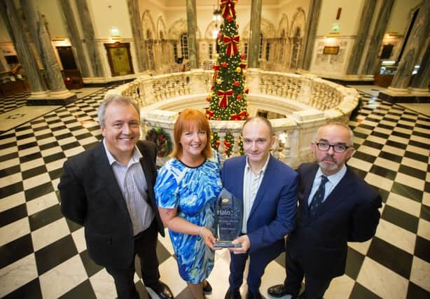 Norbert Sagnard receives his 2016 Business Angel of Year award from Judith Totten of Upstream with Alan Watts of Halo, left, and 2015 Business Angel of the Year Stuart Harvey