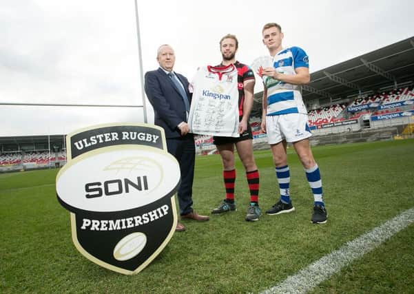 Nick Fullerton, Senior Manager at SONI with Armaghs James Hanna and Dungannons Jake Finlay launching SONIs Player of the Round at Kingspan Stadium