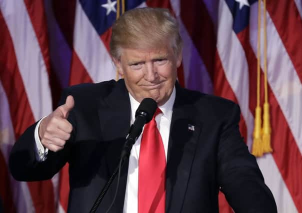US President-elect Donald Trump during won the White House race despite winning 1.9% less votes than Hilary Clinton. (AP Photo/John Locher)