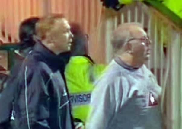 Stills from a documentary on Hibernian FC in 1999 show kit man Jim McCafferty (right) celebrating on the touchline with manager Alex McLeish.