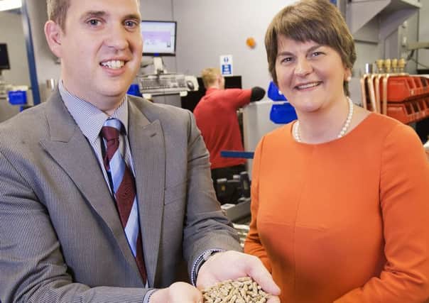 Arlene Foster, right, with Stuart Cousins of Warmflow Engineering