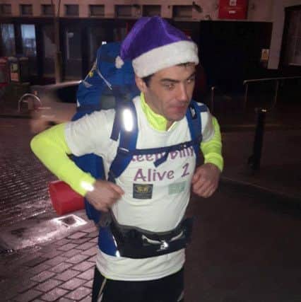 Kyle Moore starts the 300-mile run in aid of his brother