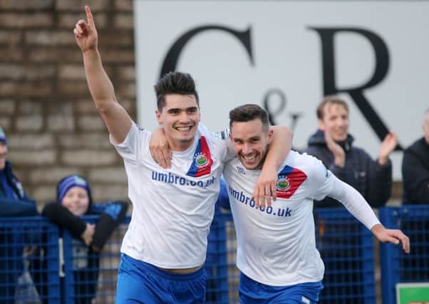Linfield's Jimmy Callacher celebrates after scoring to make it 0-2.