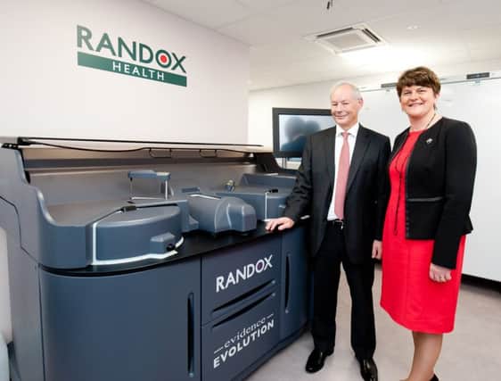 Randox founder Dr Peter FitzGerald pictured with First Minister Arlene Foster at the new clinic