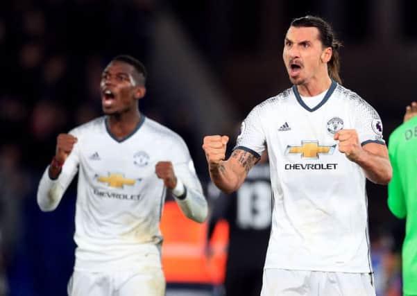 Manchester United's Paul Pogba and Zlatan Ibrahimovic (right) celebrate after the Premier League match at Selhurst Park, London. Pic: Press Association.