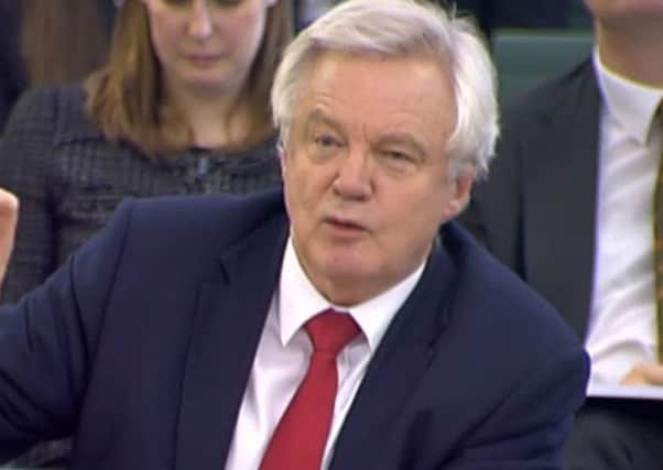 Brexit Secretary David Davis gives evidence to the Commons Exiting the EU Committee at Portcullis House in London