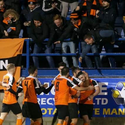 Carrick fans and players join in jubilation.

Photographer -  Matt Mackey / Press Eye