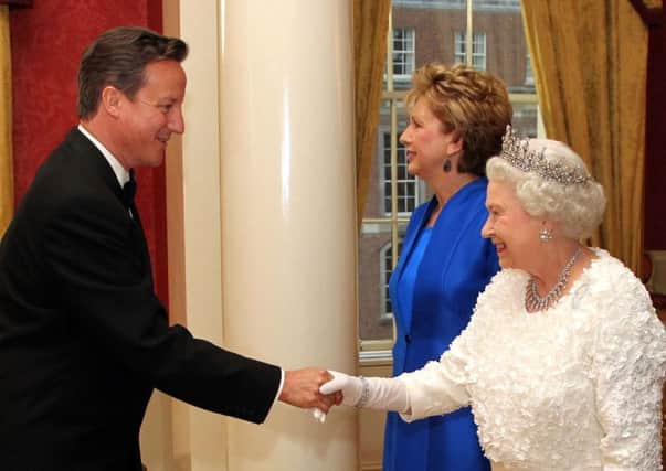 The Queen with then prime minister David Cameron and Irish president Mary McAleese during her Irish visit in 2011
