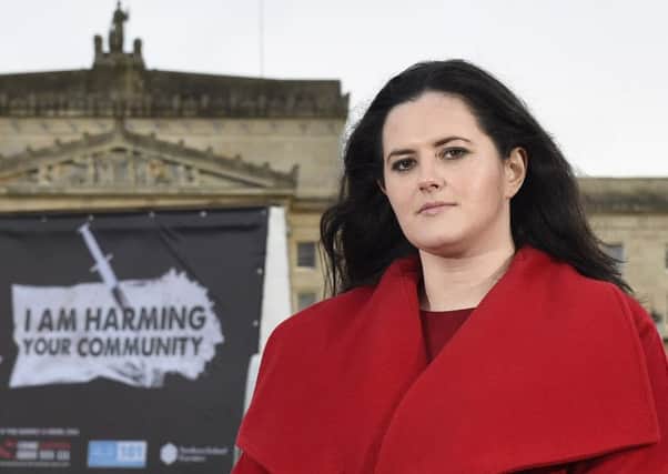 Claire Sugden pictured outside Parliament Buildings last week as part of an anti-crime gang advertising campaign