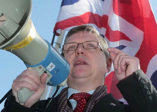 Jim Dowson addressing loyalist flag protesters at a demonstration against the decision to restrict the flying of the Union Flag at Belfast City Hall
