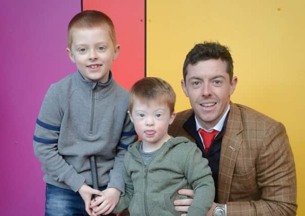 Local golf hero Rory McIlroy made his first visit to the new Mencap Centre today in South Belfast, following his donation of Â£500,000 from the Rory Foundation to support the build of the facility. Pictured with Rory in Mencap's Children's Centre is fellow golfer Eoin Burrows (7) and his brother Aodhan Burrows (4).