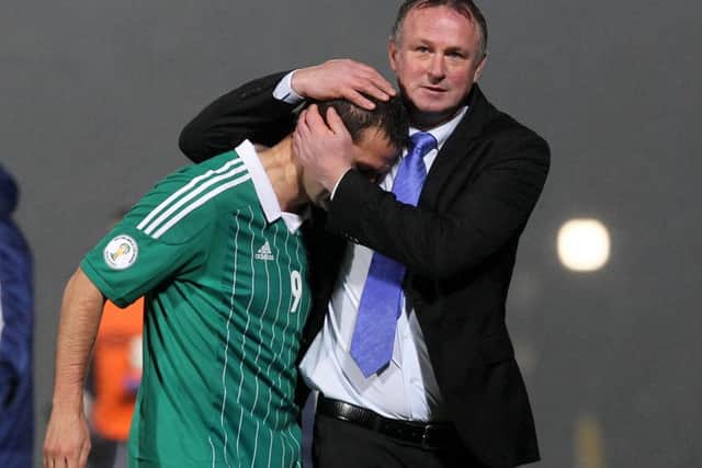 O'Neill with David Healy after the forward netted to earn a 1-1 draw with Azerbaijan back in 2012. Photo-William Cherry/Presseye