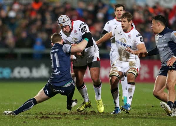 Ulster's Luke Marshall is tackled by Connacht's Matt Healy