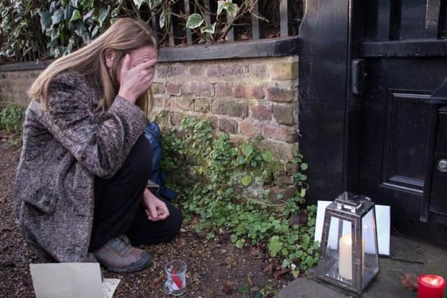 A fan outside George Michael's London home