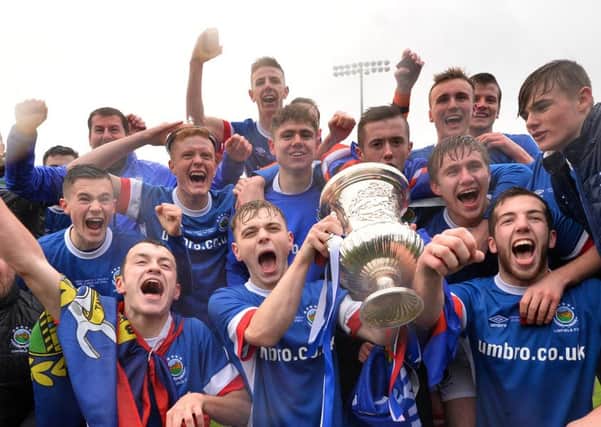 Linfield Swifts  celebrate winning the Steel & Sosn Cup final against Dundela