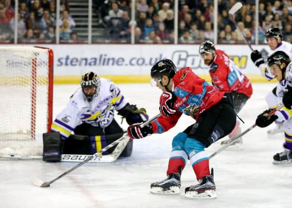 Belfast Giants' David Rutherford with Manchester Storm's Mike Clemente during Wednesdays Elite Ice Hockey League game at the SSE Arena, Belfast