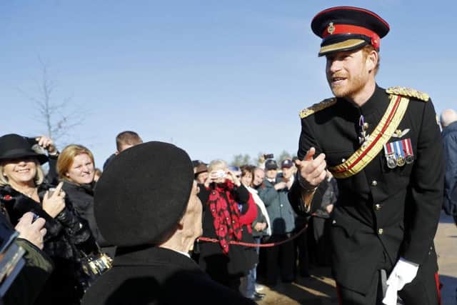 Prince Harry at a Service of Remembrance at the Armed Forces Memorial at the National Memorial Arboretum in Staffordshire