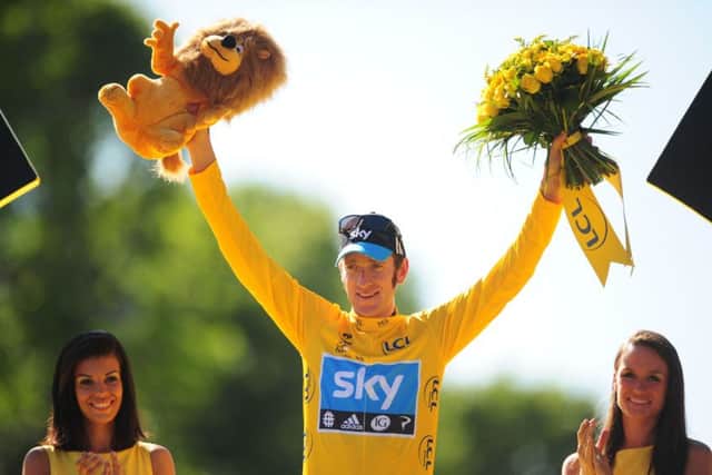 Bradley Wiggins on the winners podium, at the end the 2012 Tour de France in Paris. Photo: PA Wire.
