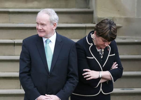 First Minister Arlene Foster and Deputy First Minister Martin McGuinness, as
Mr McGuinness has said there is an overwhelming desire in the Northern Ireland community for Mrs Foster to step aside amid a growing political crisis over a green energy scheme scandal. Photo: Brian Lawless/PA Wire