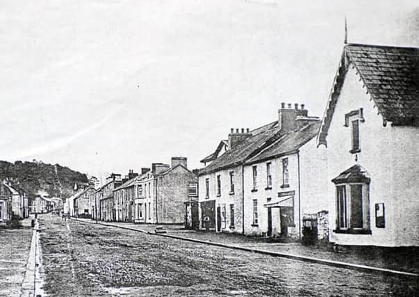 Brookeborough village. The targeted police station is on the right, with the bay window