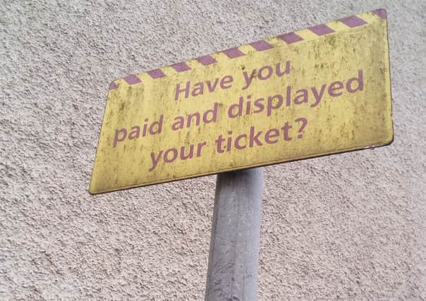 Pay and display sign at a carpark in Northern Ireland
