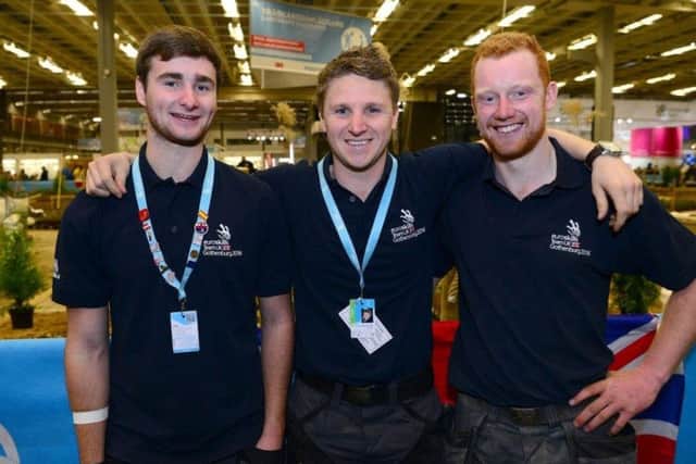 Left to right are Gold Medal winners Will Burberry and Adam Ferguson with (centre) Colin McKnight, CAFRE tutor and training manager for the UK Squad