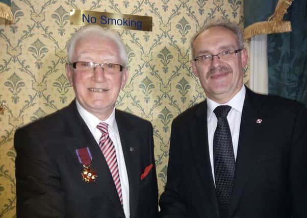 Honorary Consul for Poland Jerome Mullen (left) with Polish Consul General Dariusz Adler who presented the Co Down man with a Gold Cross of Merit award in 2016