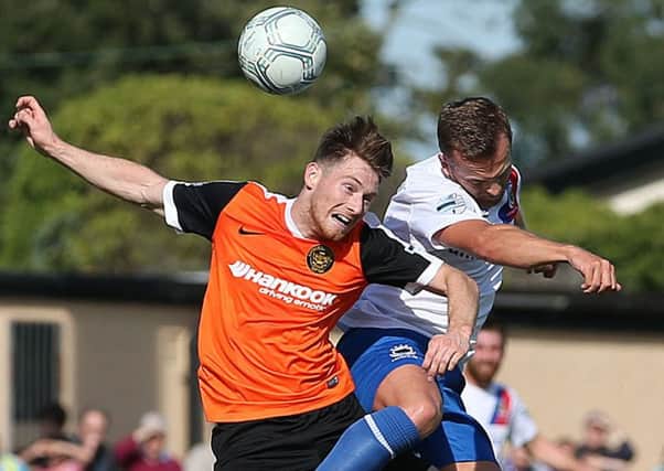 Connor McFall in action for Carrick Rangers against Linfield in September. He's now a Dollingstown player. 
Picture by Brian Little/PressEye