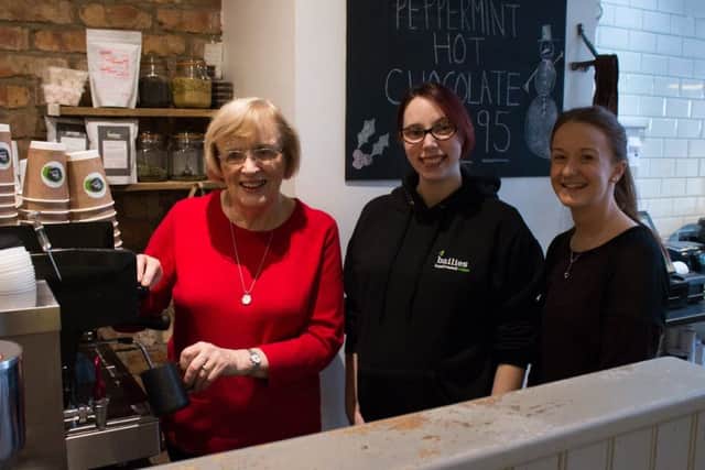 Irene Sproule shows off her barista skills.