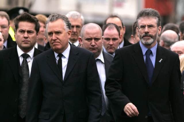Secretary of State 
Peter Hain and Gerry Adams follow the coffin at the funeral of David Ervine on the Newtownards Road in East Belfast. Pacemaker Belfast