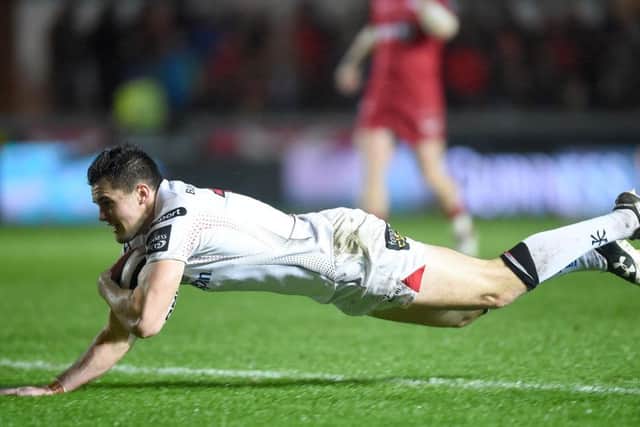 Jacob Stockdale of Ulster scores try.