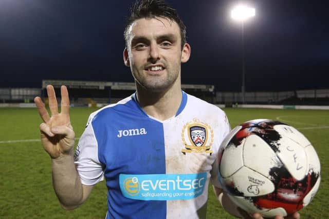 Man of the Match Coleraine's Eoin Bradley with the match ball