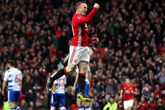 Wayne Rooney celebrates his goal against Reading