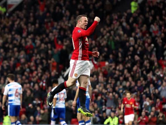 Wayne Rooney celebrates his goal against Reading