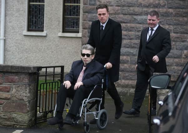 Singer Shane MacGowan is helped from the church as the funeral of his mother Therese MacGowan, 87, takes place at Our Lady of Lourdes Church, Silvermines County Tipperary