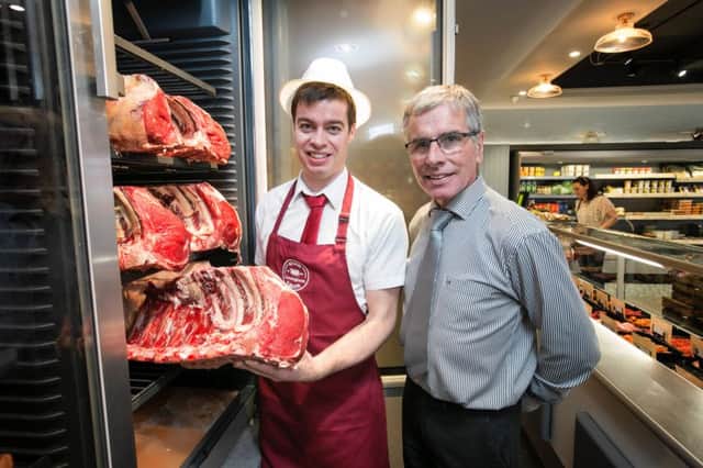 Pictured inside the newly expanded premises of Cunningham Butchers, Kilkeel, is James Cunningham Jnr who now runs the family business and his father, James Cunningham Snr.  The family run firm was recently crowned 'Best Butchers in Ireland' at the Butchery Excellence Ireland Annual Awards.