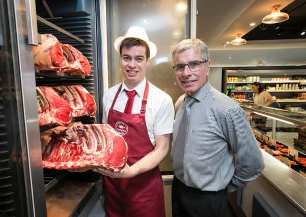Pictured inside the newly expanded premises of Cunningham Butchers, Kilkeel, is James Cunningham Jnr who now runs the family business and his father, James Cunningham Snr.  The family run firm was recently crowned 'Best Butchers in Ireland' at the Butchery Excellence Ireland Annual Awards.