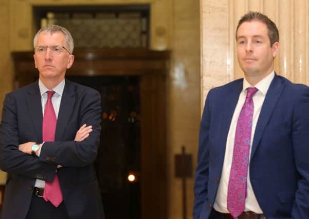 Sinn Fein's Minister Martin O Muilleoir and the DUP's Paul Givan at Stormont. Pic: PressEye.