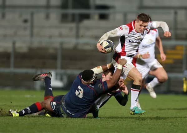 13 January 2017 - Picture by Darren Kidd / Press Eye. 
 
 Ulster A v London Scottish in round 5 of the British & Irish Cup at Kingspan Stadium.

Ulster's Johnny McPhillips is tackled by Dan Koroi and Patrick Kelly of London Scottish