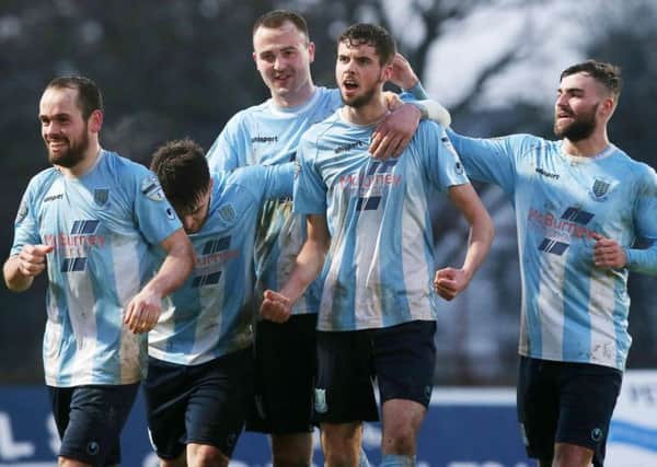 Ballymena's Caolan Loughran(centre) celebrates scoring the winning goal.

Picture by Jonathan Porter/PressEye.com