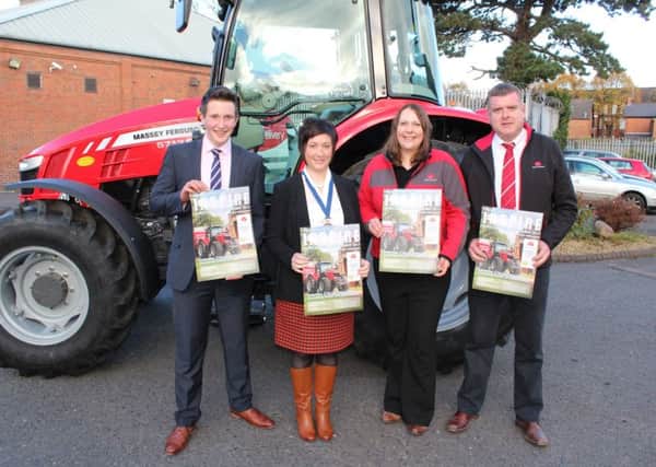 Pictured left to right are: Robert McConaghy, chairman YFCU Agriculture and Rural Affairs Committee; Roberta Simmons, president YFCU; Lindsay Haddon, advertising and sales promotion manager, Massey Ferguson and Sean McAvoy, Massey Ferguson field technical manager