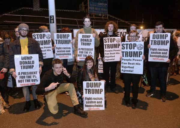 Anti Donald Trump protestors pictured at Stranmillis in Belfast ahead of a walk to the American consulate building.  Photograph by Presseye/Stephen Hamilton