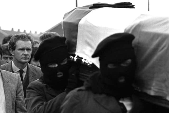 Martin McGuinness (left) follows the coffin of IRA man Charles English in Londonderry in 1984. Picture by Pacemaker