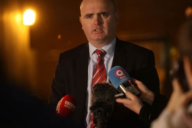 PSNI assistant chief constable Mark Hamilton speaking to the media after a police officer was shot in the arm at a petrol station on the Crumlin Road in north Belfast. Pic: PA.