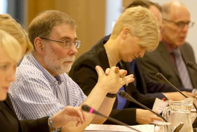 Nelson McCausland, MLA, at a Policing Board meeting in 2016