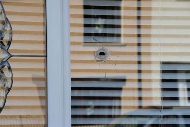 A bullet hole in a home in Ardoyne. Gerard Flannigan took possession of the gun that was used just hours later.