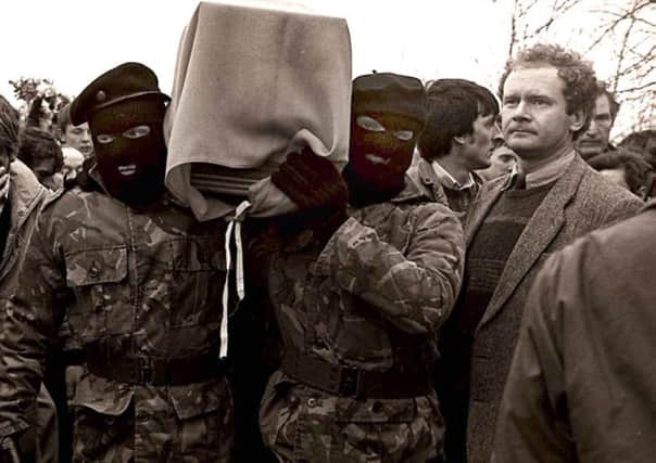 Martin McGuinness at the paramilitary funeral of Brendan Burns in 1988. Picture Pacemaker