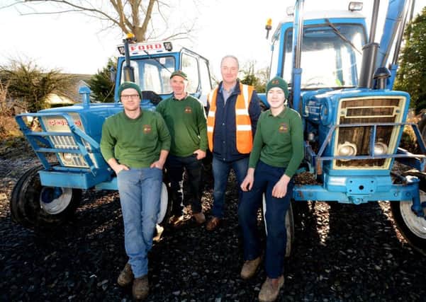 William, Mervyn ,Trevor and Edward Fegan, with their 1974 Ford 4000 and 1979 Ford 4600 vintage tractors. Â© Photo: Gary Gardiner.
