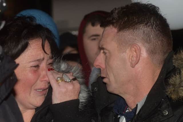 Parents Vanessa and Christopher attend a vigil for their son in December 2015