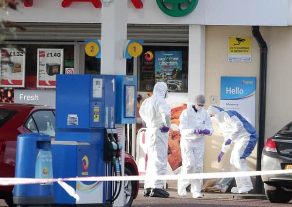 Press Eye Belfast - Northern Ireland 23rd January 2017

Forensic experts on the scene at a petrol station on the Crumlin Road in north Belfast where an on duty PSNI officer was shot in the arm during a gun attack Sunday evening. 

Picture by Jonathan Porter/PressEye.com